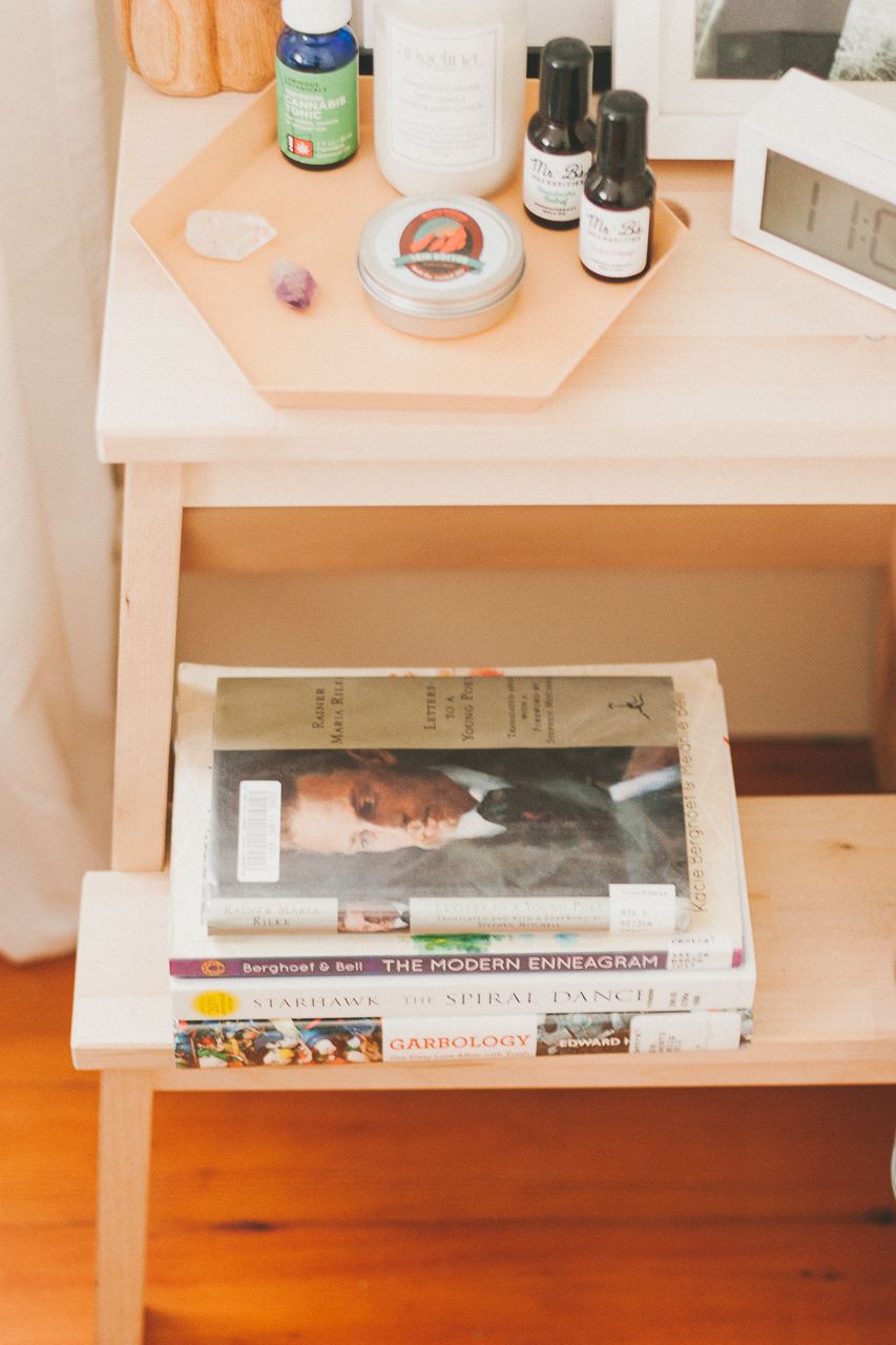 Stack of Books on Bedside Table by Conscious by Chloé